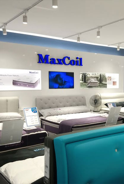 MaxCoil mattress retail display fit-out at Courts Singapore