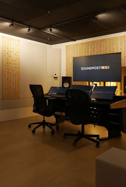 Audio production studio with acoustic wall panels and custom carpentry by Inter-Link Exhibition