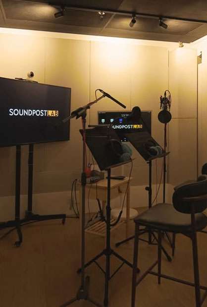 Soundproof studio control room with acoustic feature wall and production desk by Inter-Link Exhibition